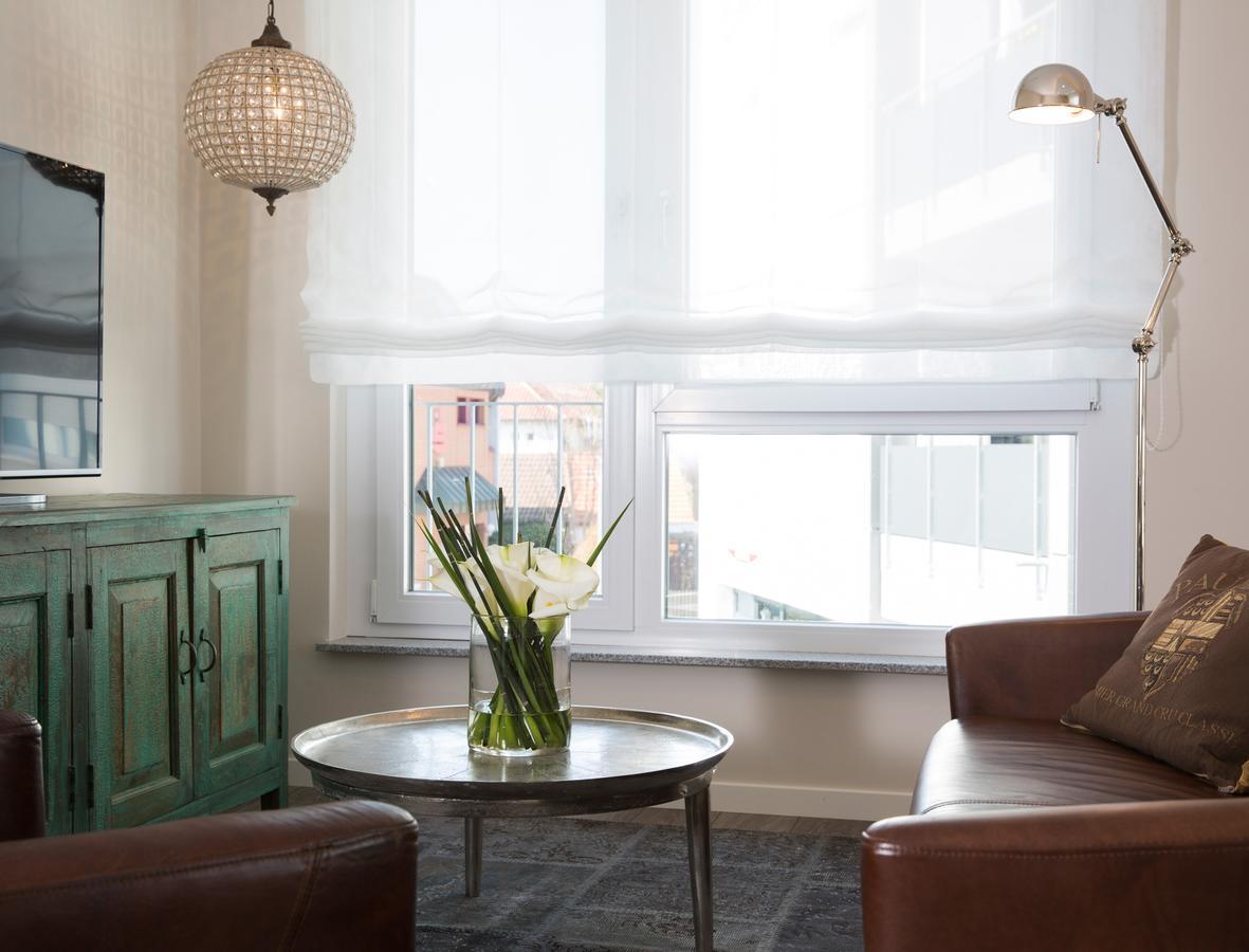 Logis First Class Business Suites Renningen Esterno foto